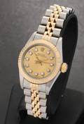 Rolex Oyster Perpetual Lady. Dameur i 18 kt. guld og stål, 1986