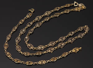 Filigran, smykkesæt i 18 guld. 2