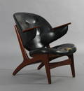 Ubekendt møbelproducent. Lænestol, teak, sort kunstlæder