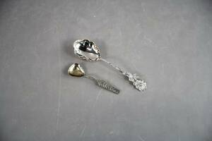 Kompottskedar i silver 2 st