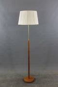 Golvlampa i teak och mässing