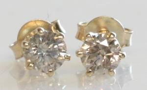 Par brillantørestikker, ca. 0.65 ct. 2