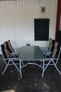 Utegrupp i glas och metall 7 delar, bord och stolar 42