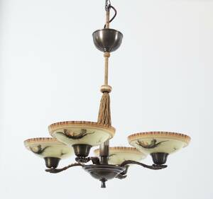 Taklampa med fyra ljuspunkter, 1900-talets första hälft