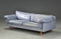 Tre-personers sofa med løse hynder  