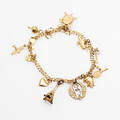 Berlockarmband 18 k guld