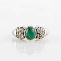 Ring 18 k vitguld smaragd diamanter