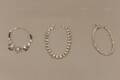 Fotlänkar 2 st och armband