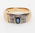  RING, guldvitguld 18 k med diamanter ca. 0,08 ct och blå sten, troligen safir, total vikt ca. 7,2 gram.