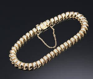 Brillantarmbånd af 14 kt. guld, i alt ca. 2.40 ct