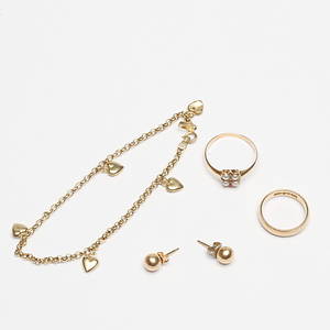  GULDSMYCKEN, 18k guld, vikt ca 7,8 gr.