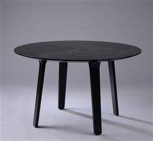 Cirkulært spisebord af sortmalet træ