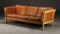 Dansk møbelproducent. Tre-pers. sofa, cognacfarvet skind, 1980erne