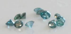 13 uindfattede brillanter på ialt ca. 2.03 ct. 13