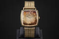 Omega Automatic. Vintage herrearmbåndsur af guld 18 kt. Cal 562