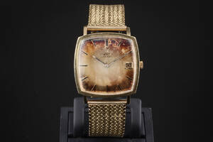 Omega Automatic. Vintage herrearmbåndsur af guld 18 kt. Cal 562