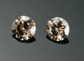 To uindfatede brillanter, ca. 1.04 ct.