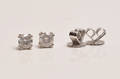 Par solitaire brillantørestikker, ca. 0,59 ct