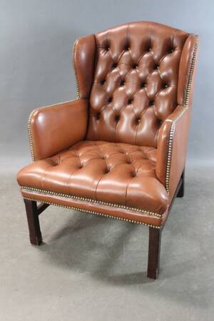 Öronlappsfåtölj i skinn