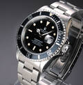 Rolex Submariner. Herreur i stål med sort skive med dato, ca. 1990