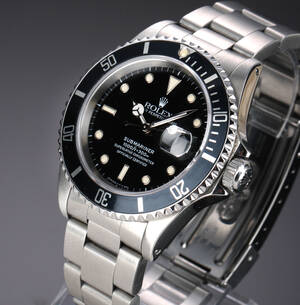 Rolex Submariner. Herreur i stål med sort skive med dato, ca. 1990