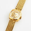Tissot damarmbandsur i 18 k guld 