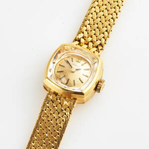 Tissot damarmbandsur i 18 k guld