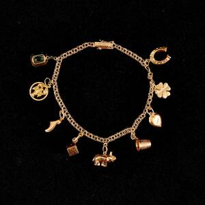 Armband, med berlocker