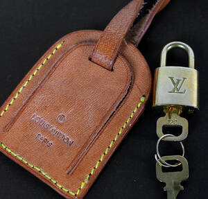 Louis Vuitton, hänglås samt bagagelapp