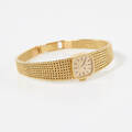 Omega damarmbandsur i 18 k 