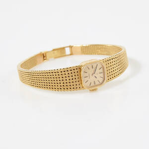 Omega damarmbandsur i 18 k 