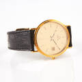 Omega herrarmbandsur i 18 k guld 