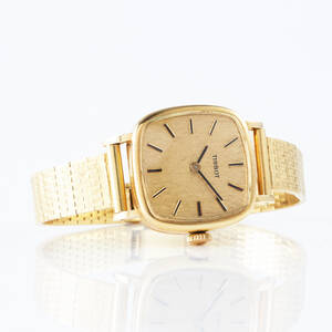 Tissot damarmbandsur i 14 k guld