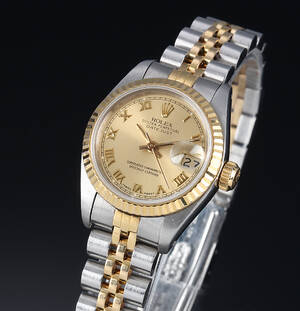 Rolex Datejust. Dameur i 18 kt. guld og stål med charmpagnefarvet skive, ca. 1989 Denne vare er sat til omsalg under nyt varenummer 5015213