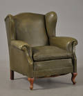 Øreklapstol med grønt læder, ca. 1940