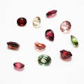 Turmaliner 11 st oinfattade 25,50 ct