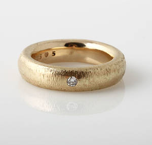 Ole Lynggaard. The Ring med brilliantslebet diamant på ca. 0.03 ct