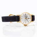 Tissot damarmbandsur i 18 k guld 