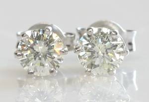Par brillantørestikker, ca. 0.91 ct. 2