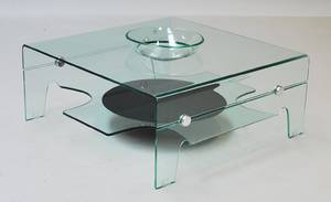 Minimalistisk sofabord i formbøjet glas