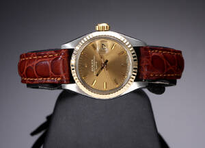 Rolex Datejust. Dameur i 18 kt. guld og stål med champagnefarvet skive, ca. 1979