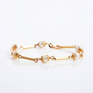 Armband 18 k guld saltvattenspärlor