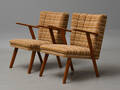 Dansk møbelproducent. Et par lænestole med stel af teak. 1940erne. 2