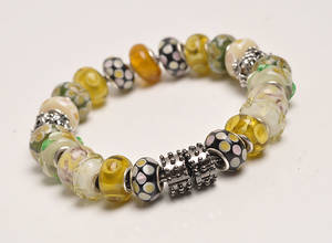 Charlotte Borgen, armlænke med med 23 charms