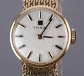 Tissot. Dameur af guld 9K