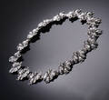 Hans Jensen, Århus. Halskæde af sølv med stiliserede blomster, ca. 1930erne