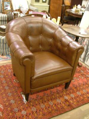 Clubfåtölj, Läder