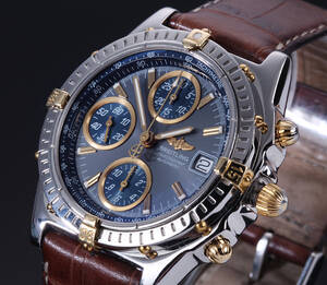 Breitling Chronomat. Herrechronograf i 18 kt. guld og stål med grå skive, Denne vare er sat til omsalg under nyt varenummer 4183393