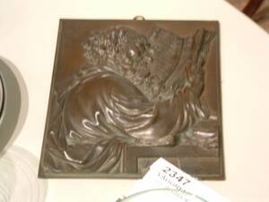 Väggrelief, metall
