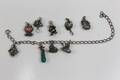 ARMBAND med berlocker, 4 st, silver